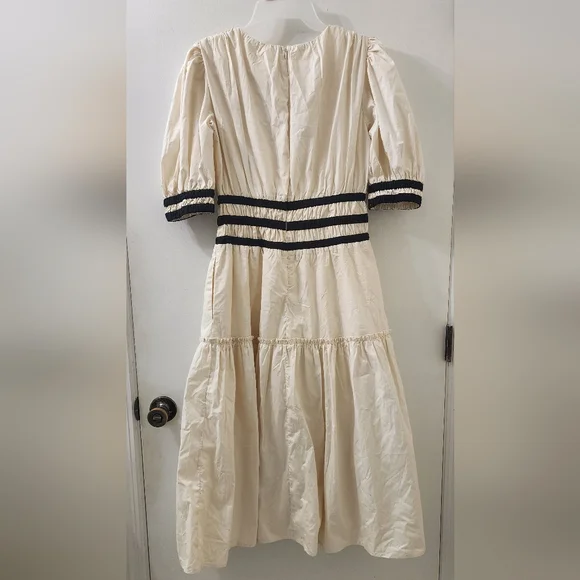 Aureum Elegant Cream Dress with Black Accents - Picture 9 of 11